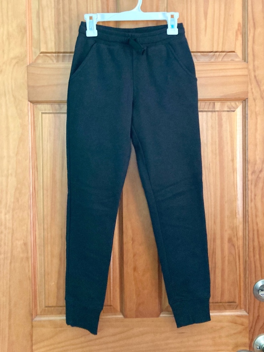Girl’s size medium Amazon Essentials black sweatpants with ribbed ankles